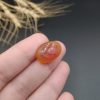 نگین عقیق پرتقالی اصل معدنی حکاکی شرف الشمس روی سنگ کد 8449