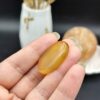 نگین عقیق زرد خراسان اصل معدنی مزین به دعای شرف الشمس اعمال مخصوص انجام شده ( رزق و روزی ) کد 9213
